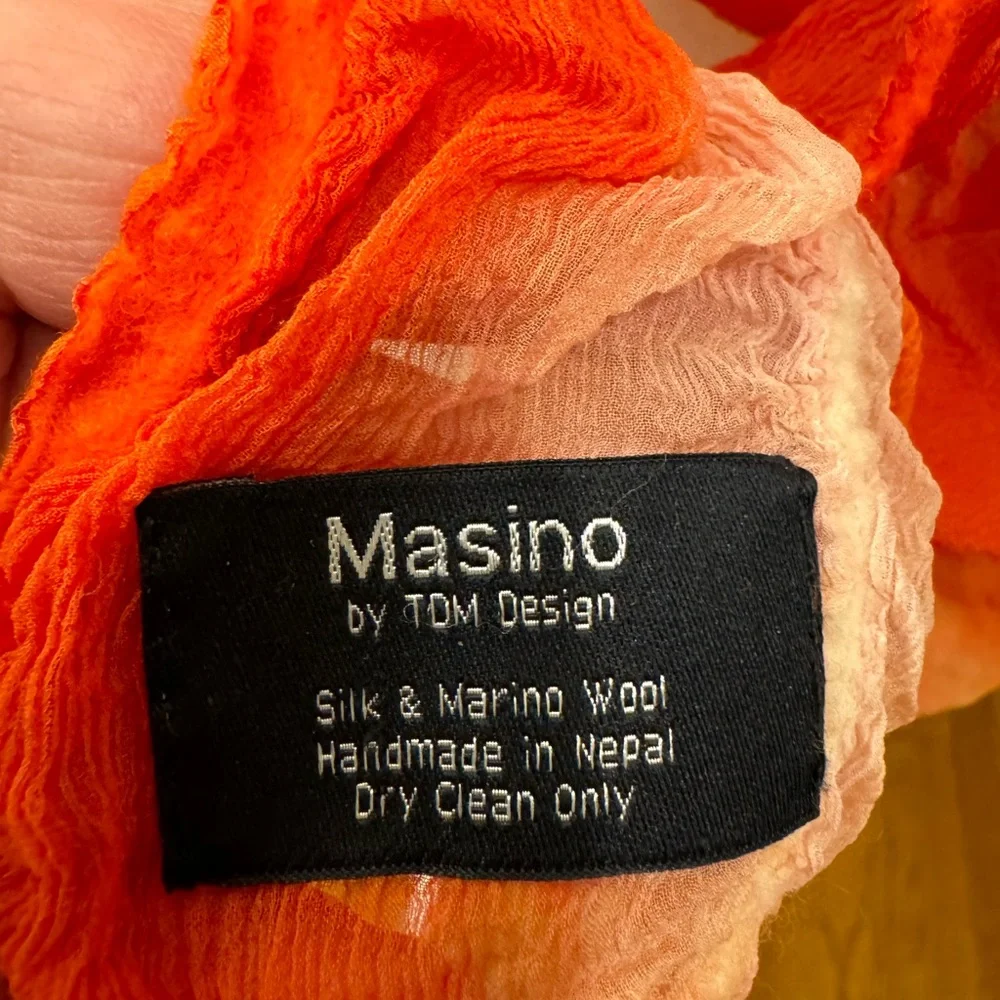 Vintage Masino Silk and Wool Crinkle Scarf in vibrant orange hues.